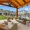 nice outdoor patio covered by the pool