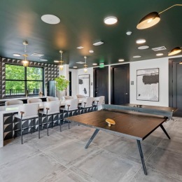 Building #4 residents enjoy an exclusive lounge with a coffee station ☕️, grill ?, and ping pong table indoor game room with ping pong table