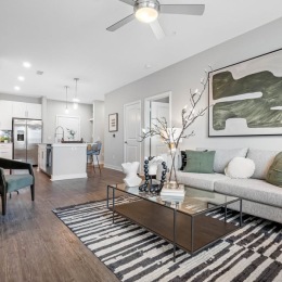 Discover the perfect backdrop for your style with our neutral-colored apartments, designed to complement any furniture. beautiful living room